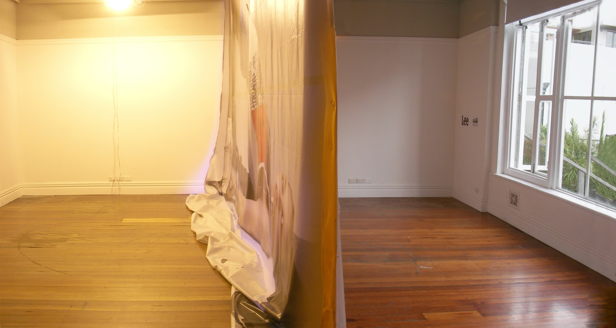 Believing in Politics | Lee Jeans billboard skin, hydroponic grow lamps | variable dimensions | Enjoy Gallery, Wellington | 2008 | https://enjoy.org.nz/believing-in-politics